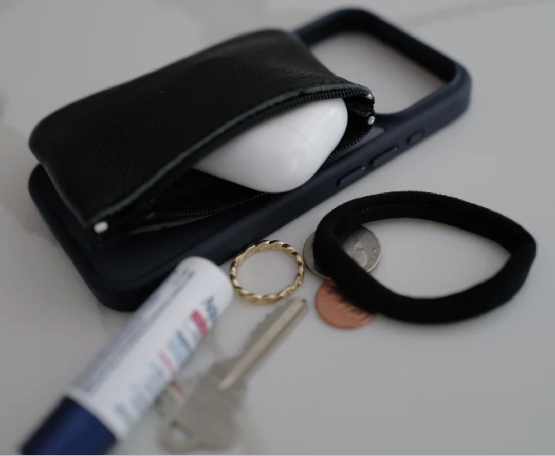 Y|Pocket holding everyday essentials on a phone